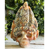 Crazy Lace Agate Crystal Indian Skull featuring vibrant patterns, perfect for decoration and spiritual energy.