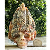 Crazy Lace Agate Crystal Indian Skull featuring vibrant patterns, perfect for decoration and spiritual energy.