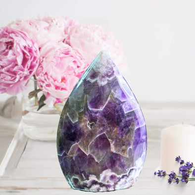 Dream Amethyst Crystal Free Form with striking purple hues and chevron patterns, perfect for energy healing and decor.