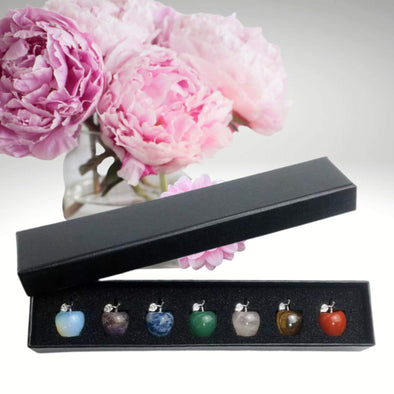 7 Apple Gemstone Crystal Gift Set featuring a variety of polished gemstones in apple-shaped designs, perfect for gifts and crystal enthusiasts.