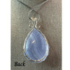 Blue Lace Agate crystal pendant necklace, featuring a delicate blue stone known for its calming and soothing properties.