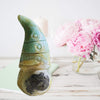 Ocean Blue Caribbean Calcite Gnome: Adorable figurine crafted from rare calcite, showcasing soothing ocean hues.