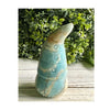 Ocean Blue Caribbean Calcite Gnome: Adorable figurine crafted from rare calcite, showcasing soothing ocean hues.