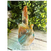 Caribbean Calcite guitar carving for music lovers with soothing blue and orange hues. Perfect for adding a touch of serenity to your space.