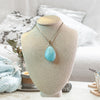 Caribbean Calcite Crystal Pendant Necklace featuring soothing blue tones, promoting calm, balance, and clarity in your life.