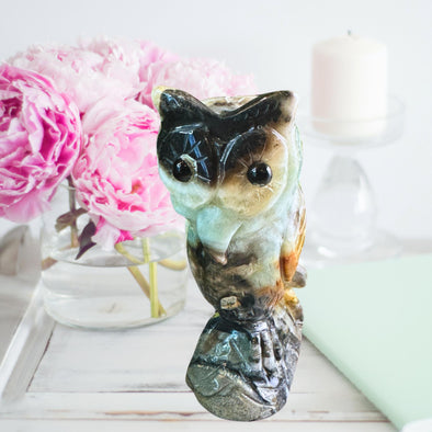 Blue Caribbean Calcite Owl Figurine – A serene, hand-carved crystal owl symbolizing wisdom and calming energy.