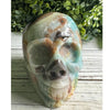 Caribbean Calcite Crystal Skull Carving - Skull Carving showcasing intricate detail with vibrant blue hues for crystal lovers