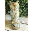 Caribbean Calcite crystal owl carving, showcasing vibrant blue and white hues, symbolizing wisdom and tranquility.