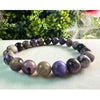 Elegant Genuine Charoite Stone Bead Bracelet for spiritual balance and personal transformation. Unique and vibrant purple crystals.