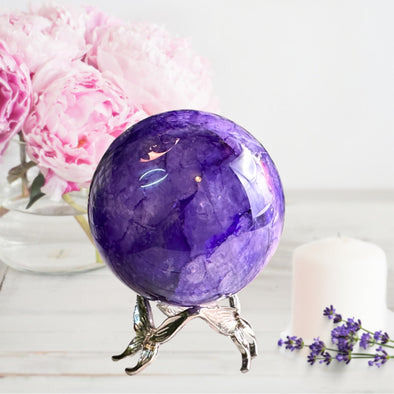 Clear Quartz Sphere With Purple Dye Inclusion