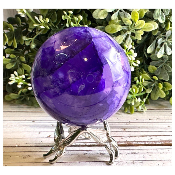 Clear Quartz Sphere With Purple Dye Inclusion