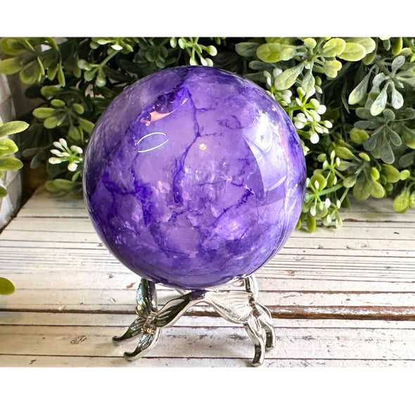 Clear Quartz Sphere With Purple Dye Inclusion