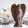 Astrophyllite Garnet Crystal Angel Carving showcasing intricate details and vibrant colors, perfect for healing.