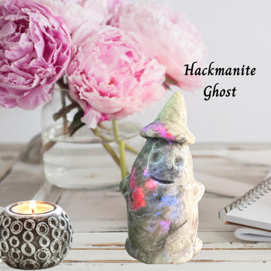 Intricately carved Hackmanite Crystal Ghost, glowing with soft hues and mystery, perfect for crystal collectors.