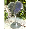 Purple Labradorite Crystal Heart with a vibrant glow, showcasing its enchanting hues and protective energy.