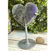 Purple Labradorite Crystal Heart with a vibrant glow, showcasing its enchanting hues and protective energy.