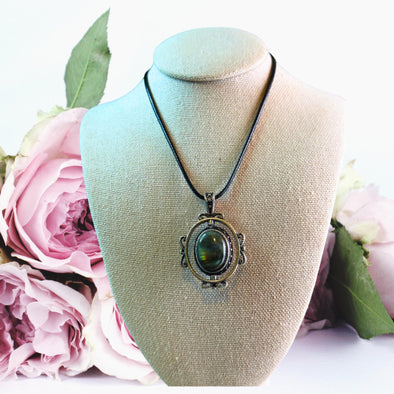 Labradorite pendant swivel necklace for women with a unique iridescent shine, perfect for adding a touch of magic to any outfit.