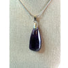 Uruguay Amethyst pendant necklace showcasing a stunning purple gemstone set in a delicate silver design.