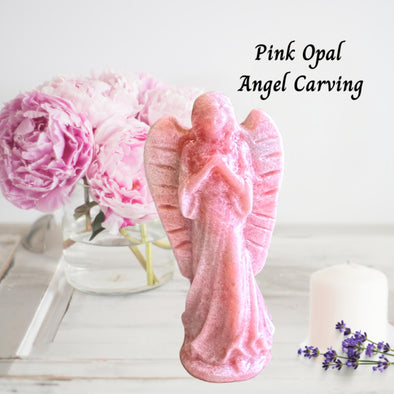 Natural Pink Opal Crystal Angel Carving showcasing soft pink hues and intricate details, perfect for spiritual decor.