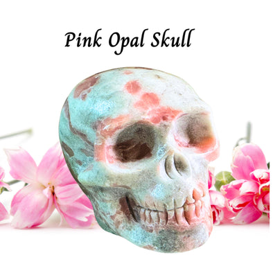 Natural Pink Opal Crystal Skull Carving: a stunning, hand-carved piece with soft pink hues for healing, balance, meditation and alter decor.