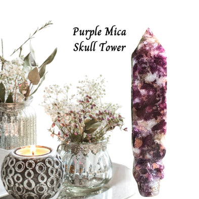 Purple Mica with Quartz Skull Tower – A unique crystal tower combining mica and quartz for grounding, and clarity.