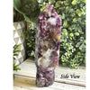 Purple Mica with Quartz Skull Tower – A unique crystal tower combining mica and quartz for grounding, and clarity.