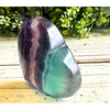 Rainbow Fluorite Crystal Heart – A vibrant healing stone for balance, clarity, and emotional well-being.