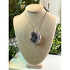 Raw Sugar Fluorite Crystal Pendant Necklace showcasing vibrant colors, perfect for healing and stylish wear.