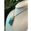 Genuine Turquoise Pendant Necklace showcasing vibrant blue hues and natural stone texture, perfect for any outfit.