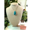 Genuine Turquoise Pendant Necklace showcasing vibrant blue hues and natural stone texture, perfect for any outfit.